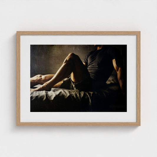 Reclining Male Figure in Contemplative Shadow Tones