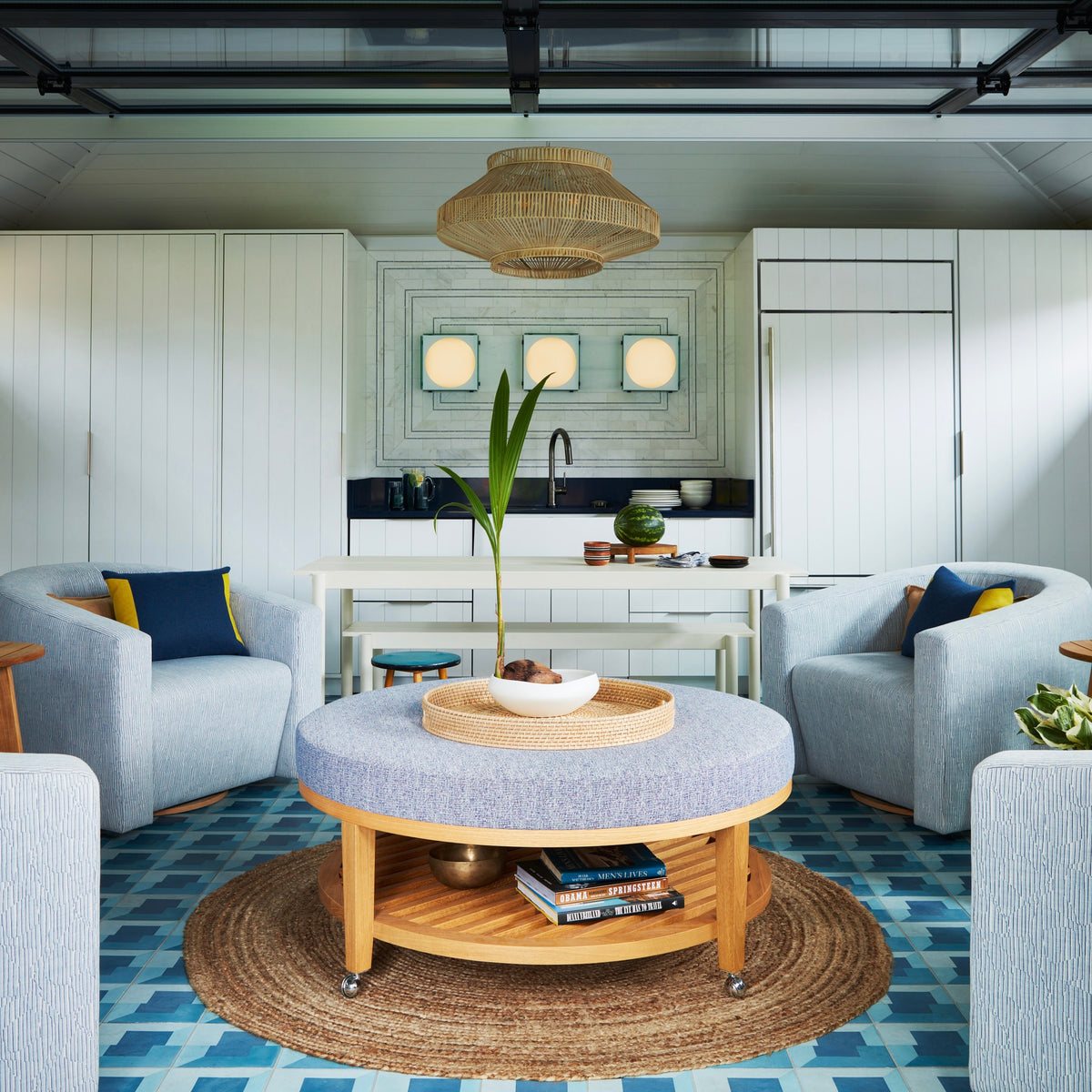 Architectural modern swivel lounge chair in a curated, sunlit residential living room.