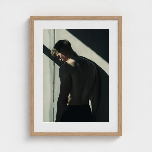 Contemplative Male Back Portrait in Soft Neutral Light