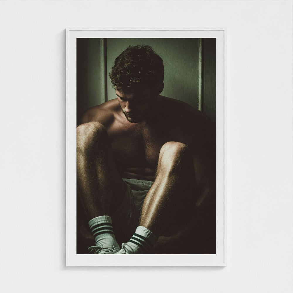 Masculine Corner Portrait in Contemplative Tonal Shadow