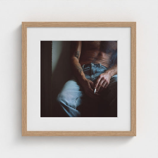 Tattooed Male Torso in Contemplative Denim Portrait
