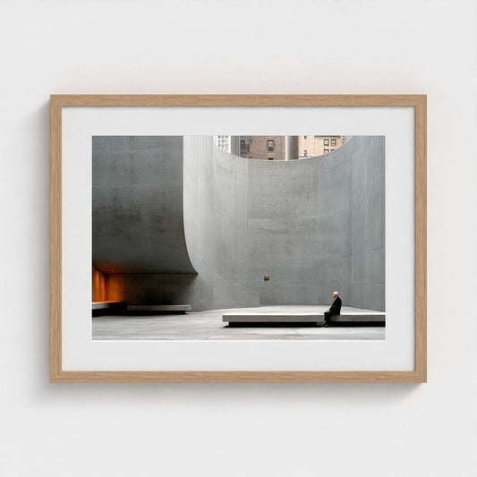 Curved Concrete Study with Seated Figure in Grey