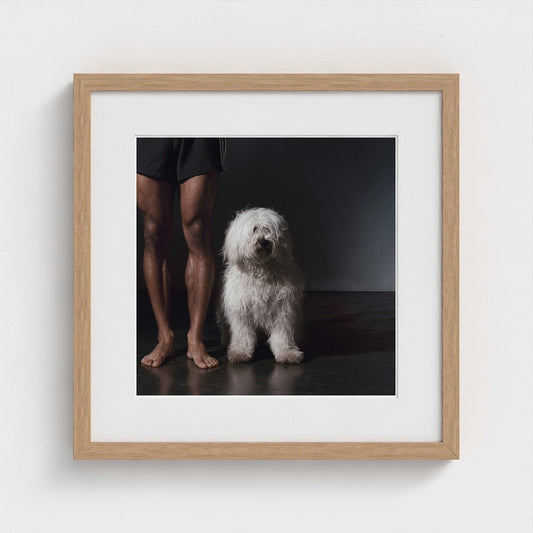 Man With White Dog Portrait in Contemplative Tones