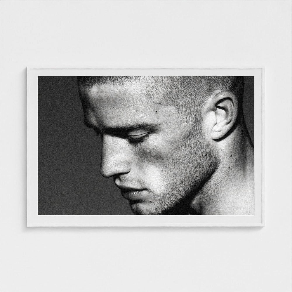 Contemplative Male Portrait in Soft Grey Tones