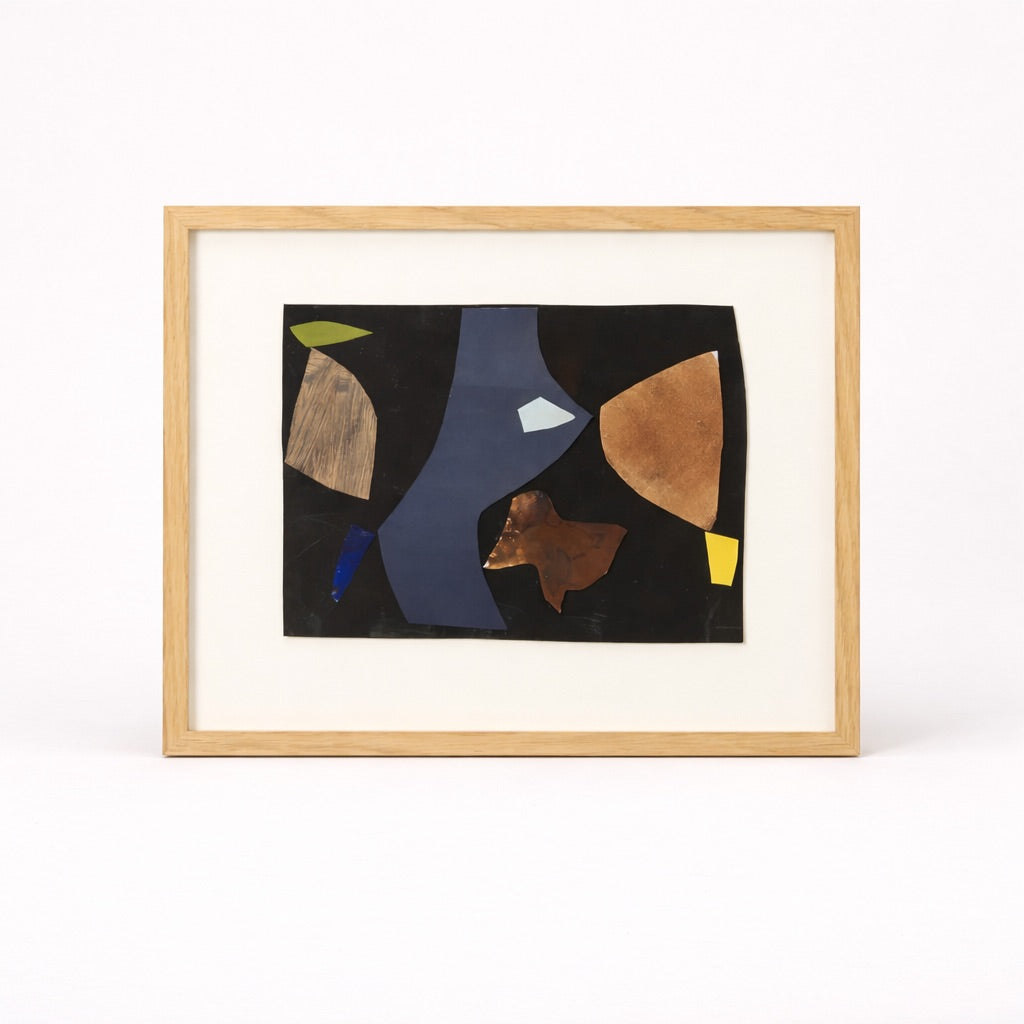 Framed abstract artwork with geometric shapes on a white background