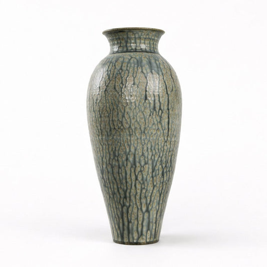 Decorative vase with textured surface on a white background