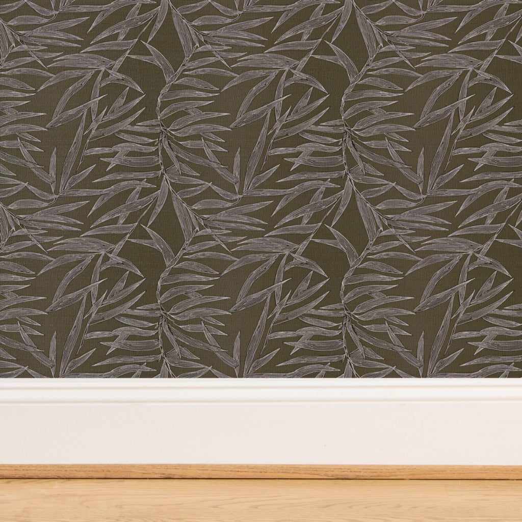 Close-up of natural woven fibers on pewter grey bamboo wallpaper.