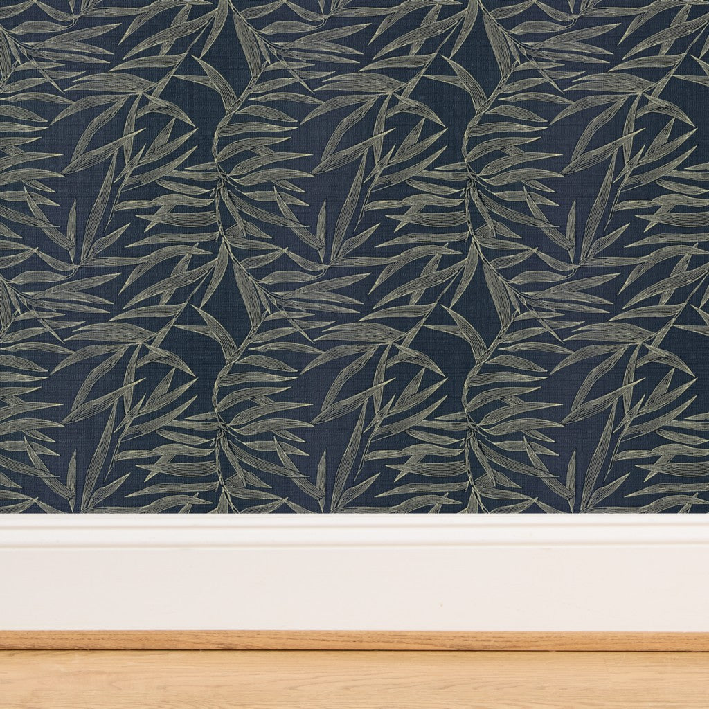 Close-up of the natural woven grasscloth substrate featuring the bamboo leaf design.