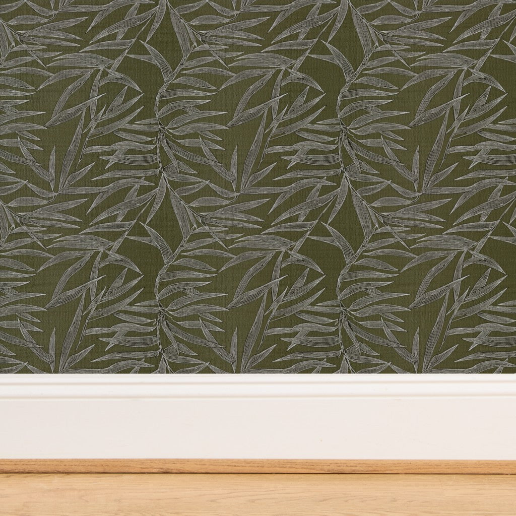 Close-up detail of the textured grasscloth weave on the Olive green Bamboo wallpaper.