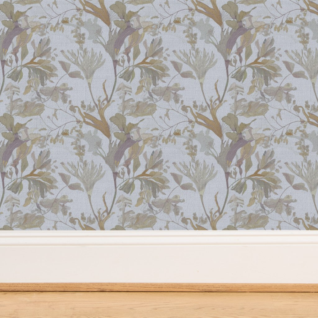 Detailed textured view of the natural grasscloth backing on foliage wallpaper.