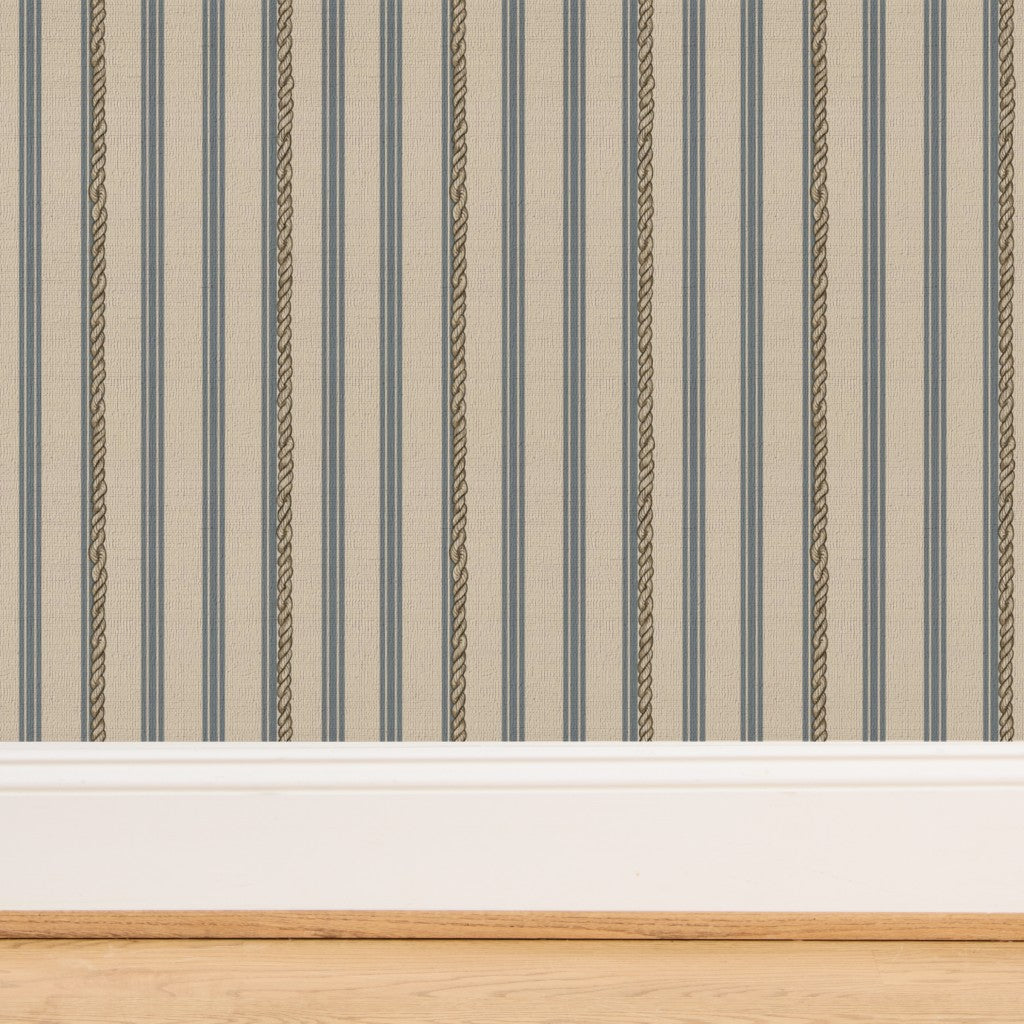 Close-up of blue stripe wallpaper on organic woven grass cloth textile