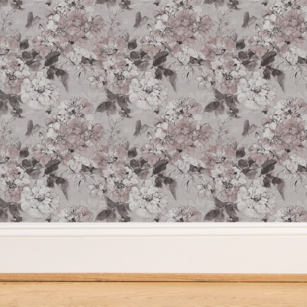 Textured weave of organic grass cloth botanical wallpaper in taupe.