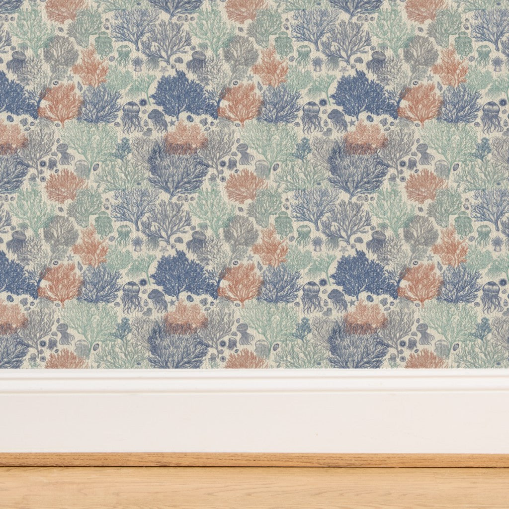Close-up of the organic woven grasscloth backing on Sun Bleached Jelly Reef wallpaper.