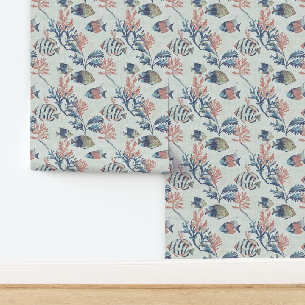 Tropical fish design on textured grass cloth substrate in light blue.