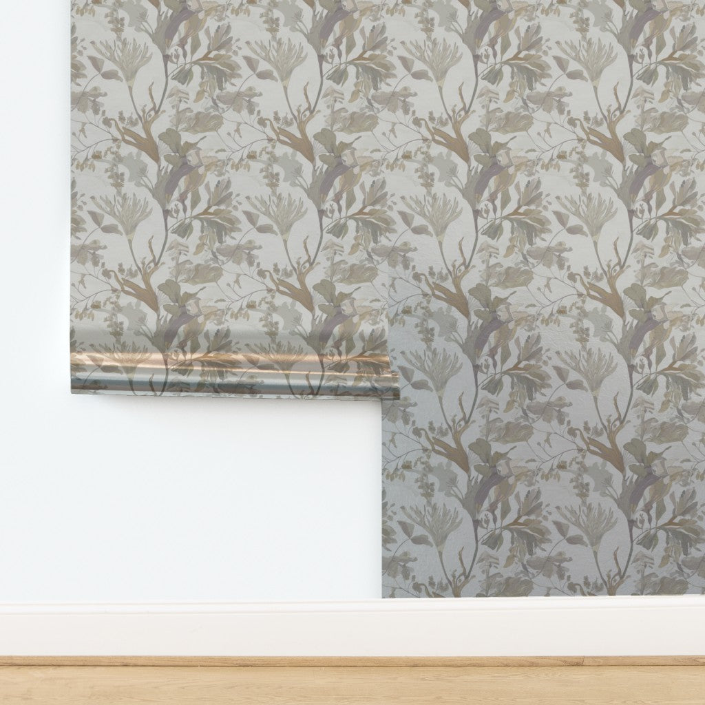 Luminous metallic substrate on seaweed and foliage patterned wallpaper.