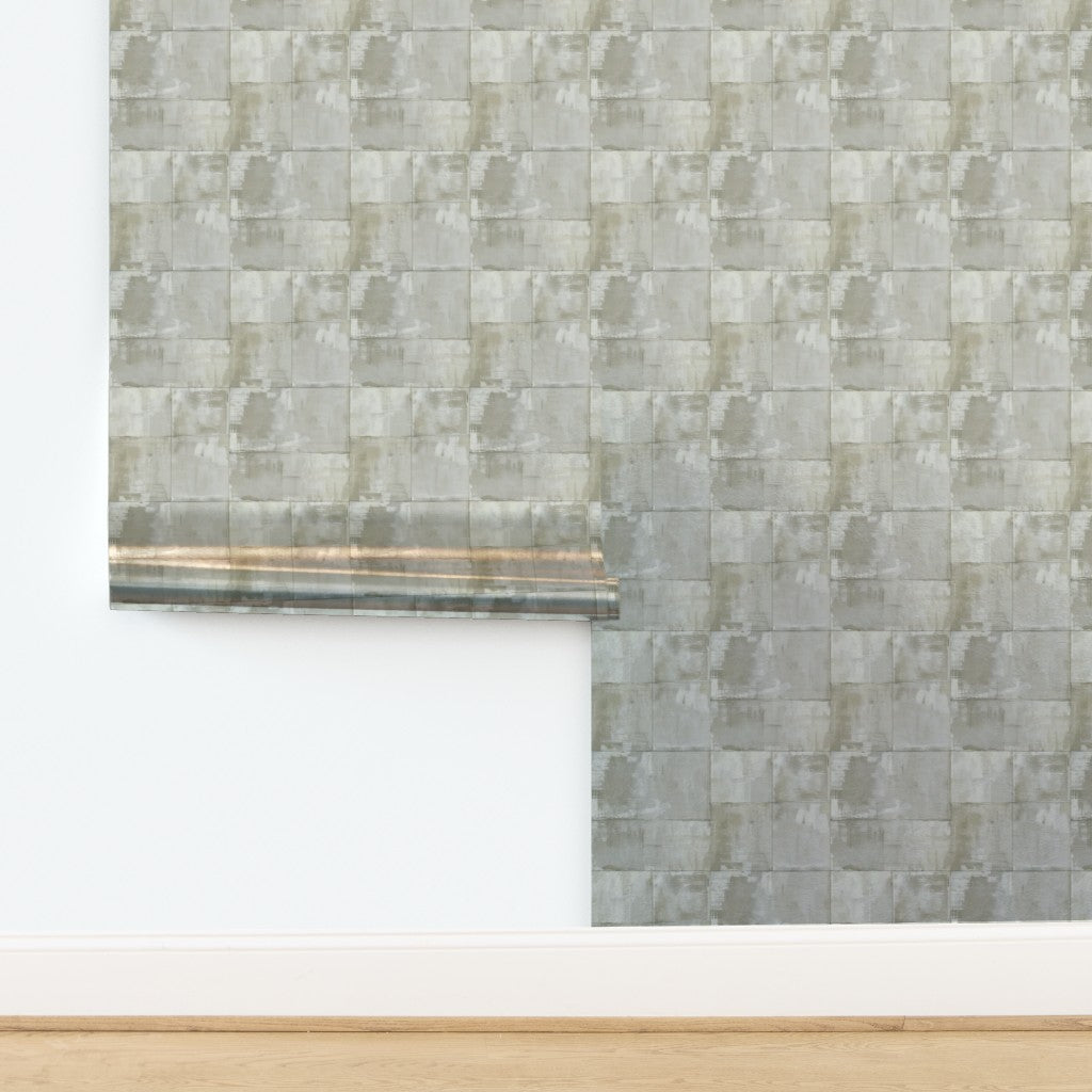Luminous metallic pearlescent finish of the Matte Limewash Panel Grid wallpaper.