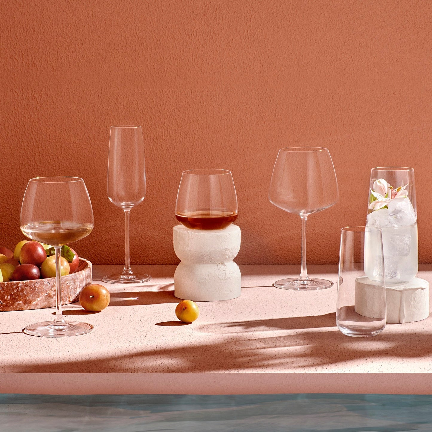 The NUDE Glass Mirage stemware collection curated together on a sleek surface.