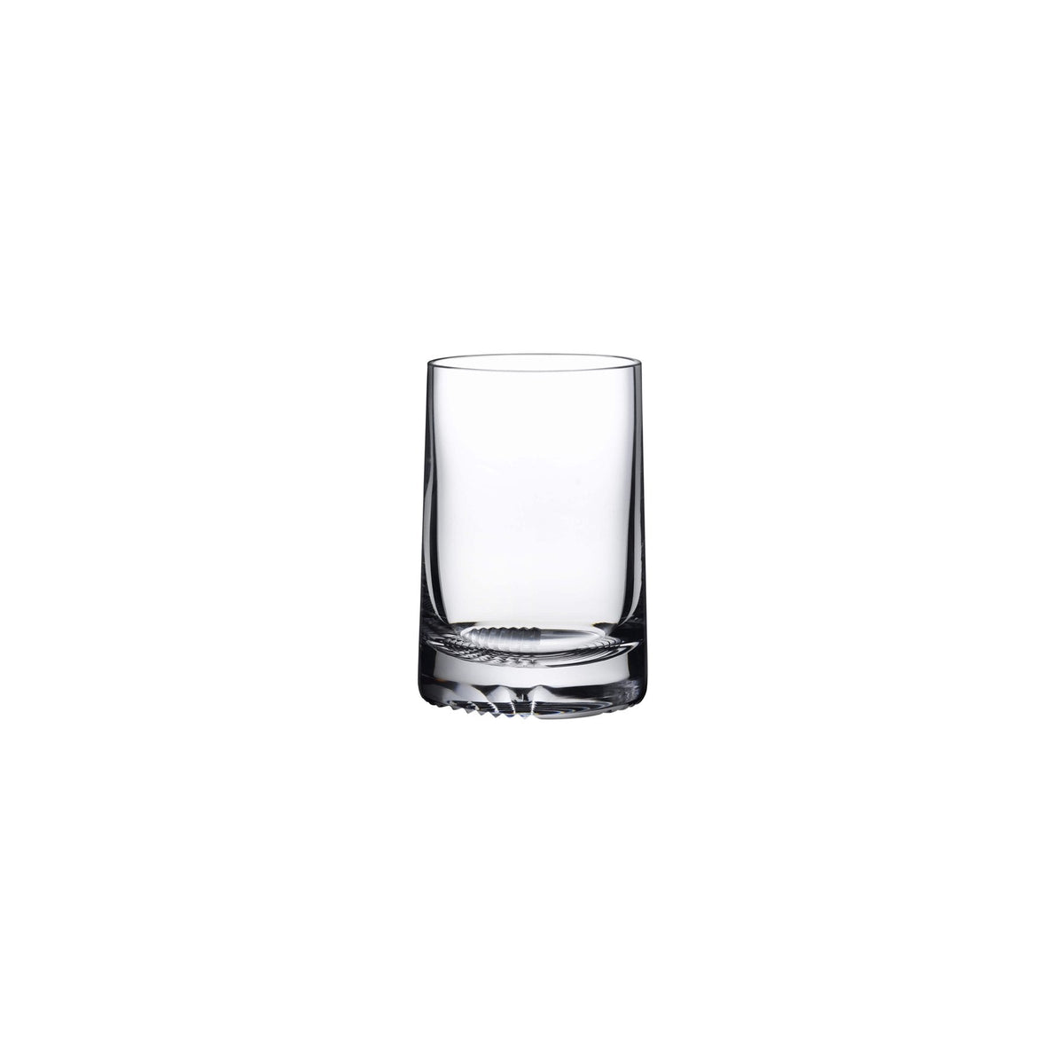 Side profile of a premium crystal whiskey glass showing its elegant tapered shape and heavy patterned bottom.