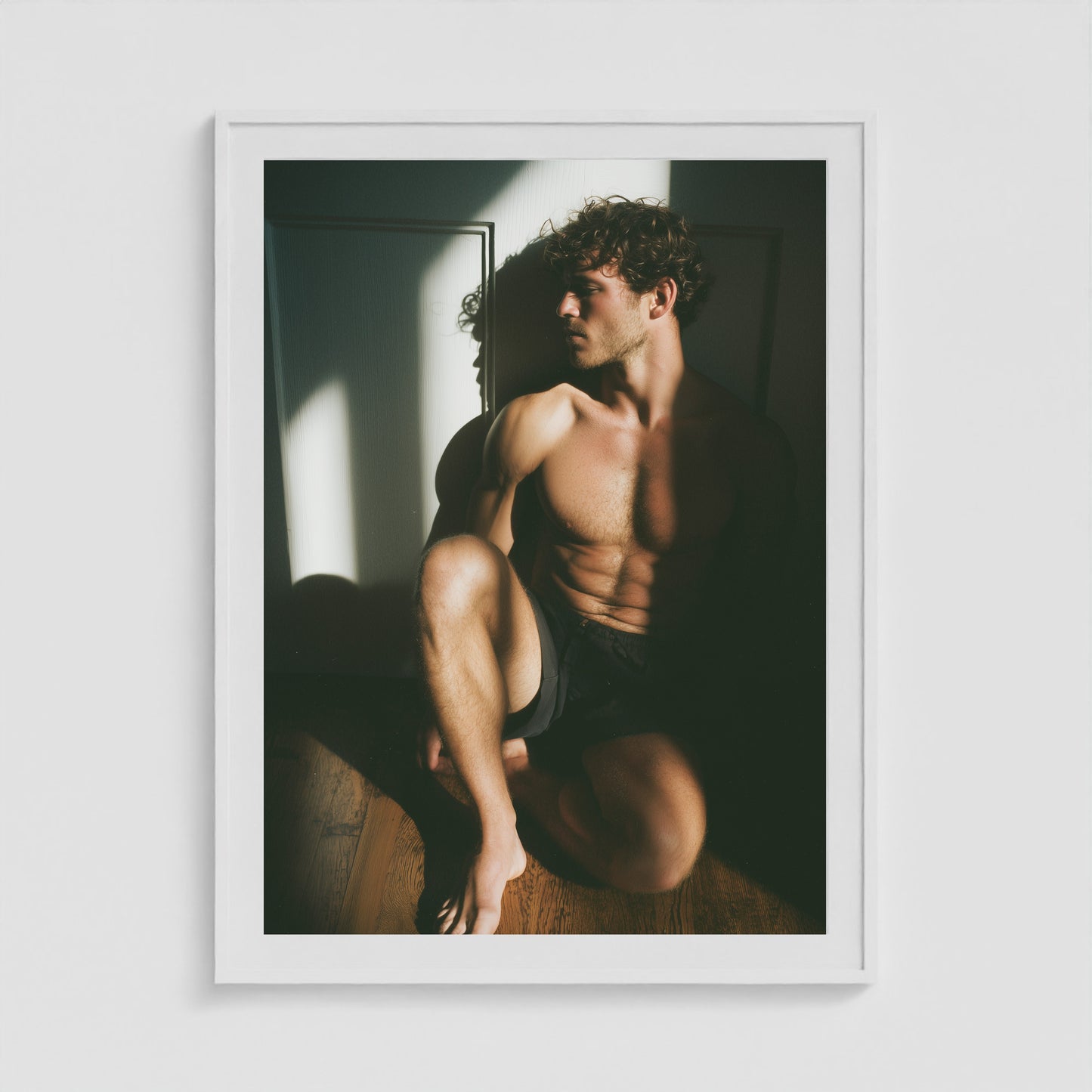Large 36x48 white portrait box frame highlighting the male figure in sunlit shadow art.
