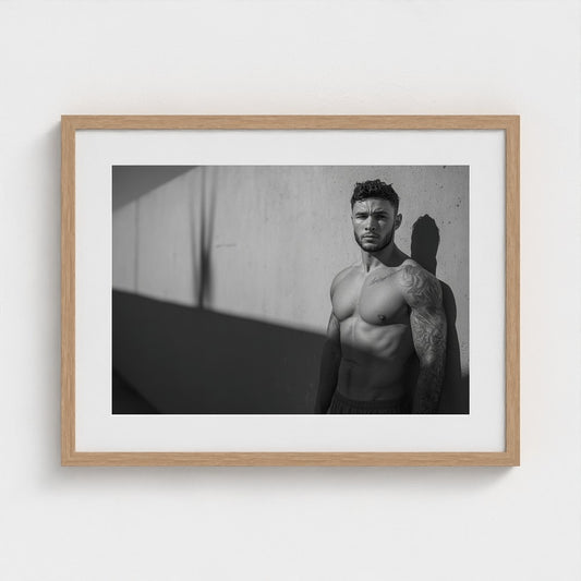 Contemplative Male Portrait Against Concrete Wall