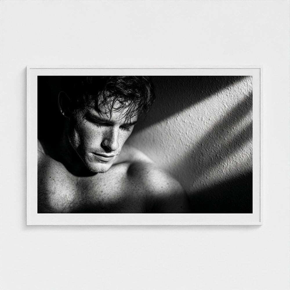 Contemplative Masculine Portrait in Grayscale Light