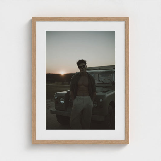 Man Beside Land Rover at Sunset in Muted Earth Tones