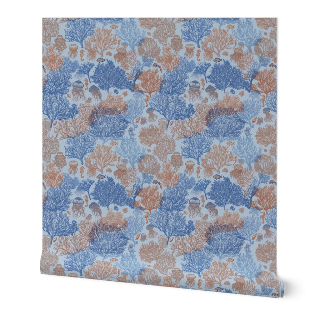 A single roll of Jelly Reef wallpaper in Coastal Blue, featuring a bright cerulean marine motif.