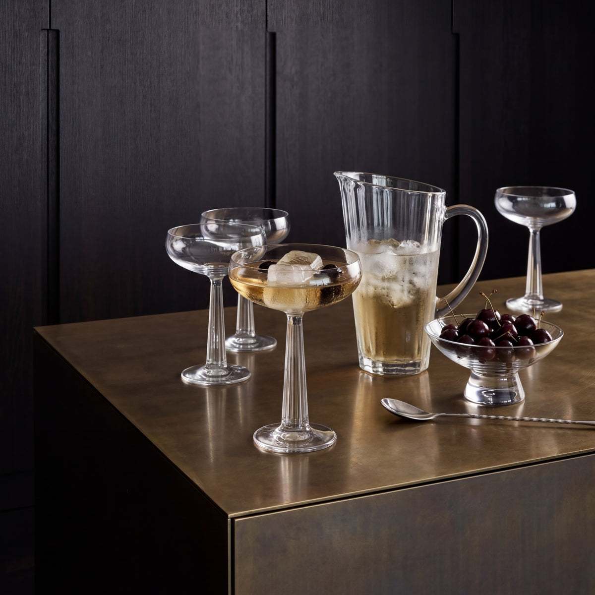 A modern NUDE Silhouette small crystal bowl on a solid base, showcasing its sculptural, circular design.