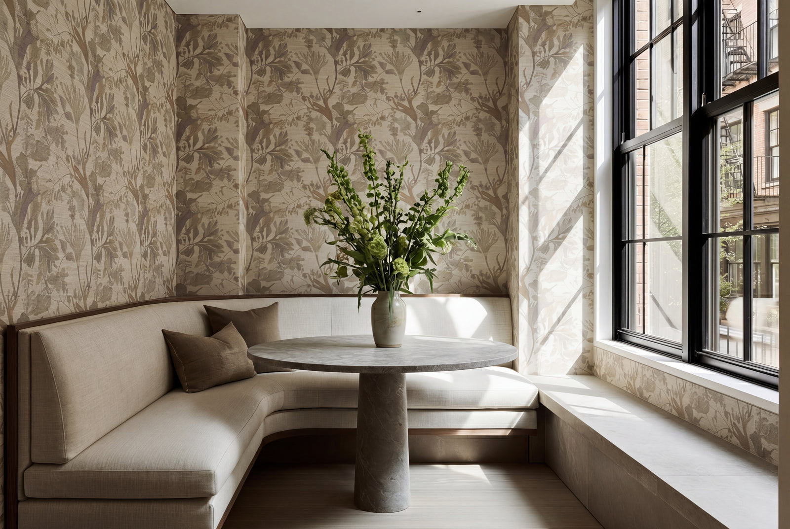 A serene bathroom interior styled with the contemporary botanical wallpaper.