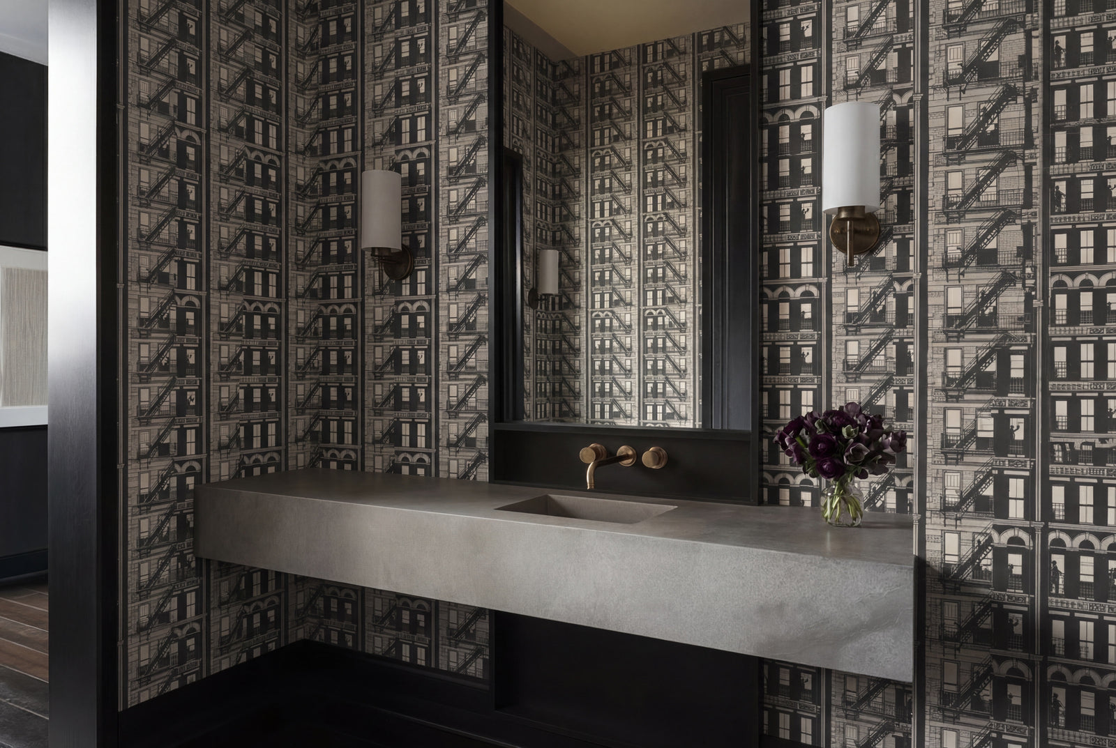 Ambient room scene featuring the artistic cityscape wallpaper on a feature wall