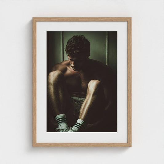 Masculine Corner Portrait in Contemplative Tonal Shadow