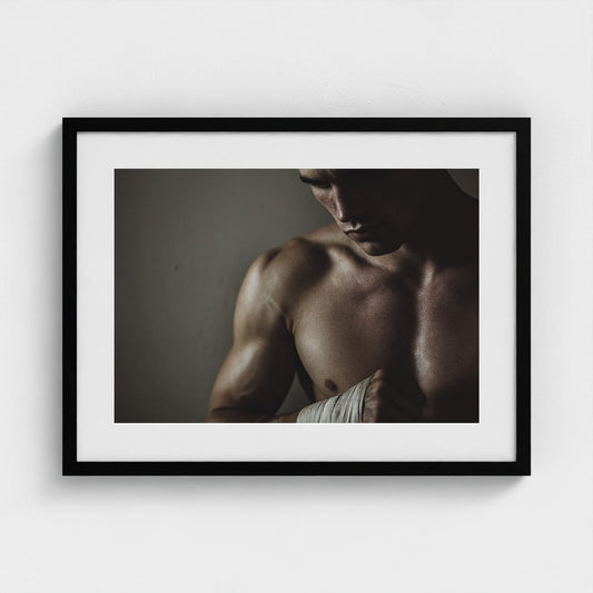 Contemplative Male Torso Portrait in Warm Low Light