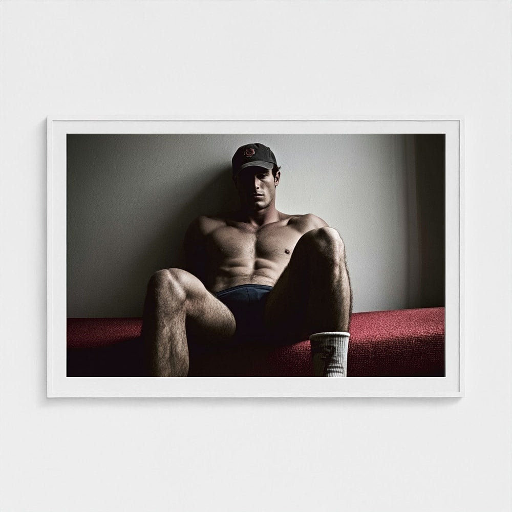 Contemplative Male Portrait in Shadowed Grey Tones