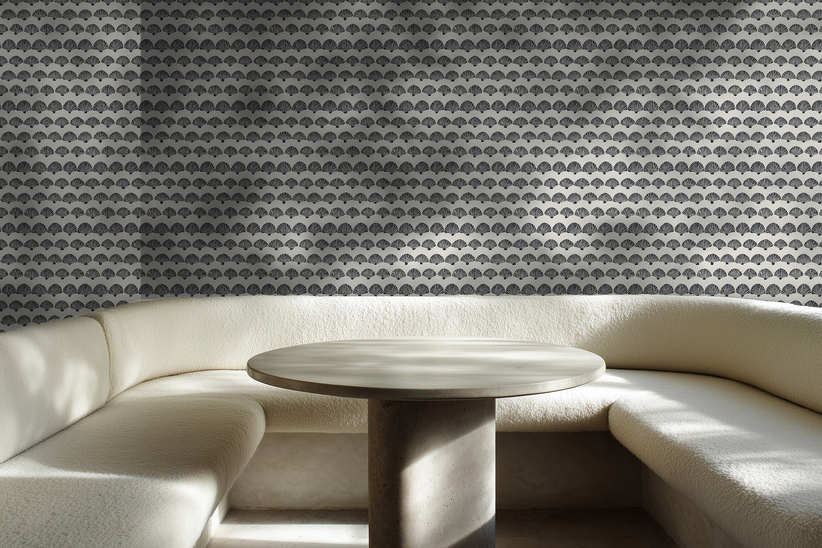 Beige geometric scallop wallpaper accenting a cozy and bright breakfast nook.