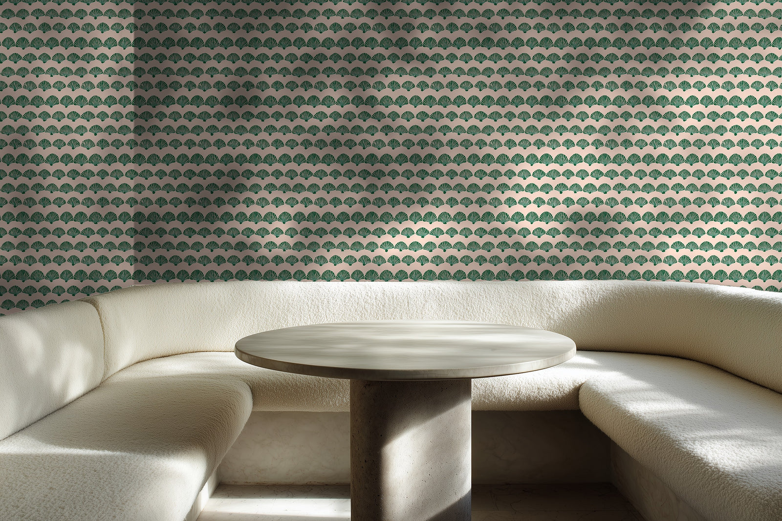 A breakfast nook featuring walls adorned with the pink modern scallop patterned wallpaper.