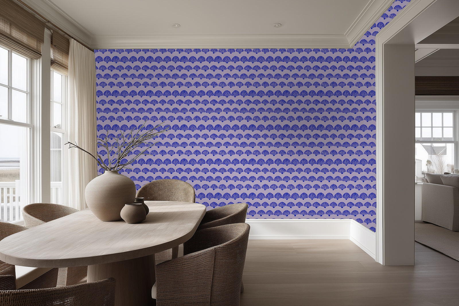 Detailed view of the purple scallop patterned wallpaper in a chic dining space.