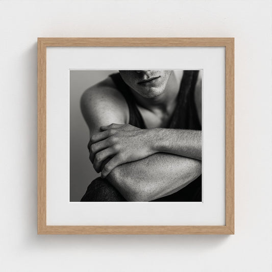 Crossed Male Arms Portrait in Quiet Monochrome Study