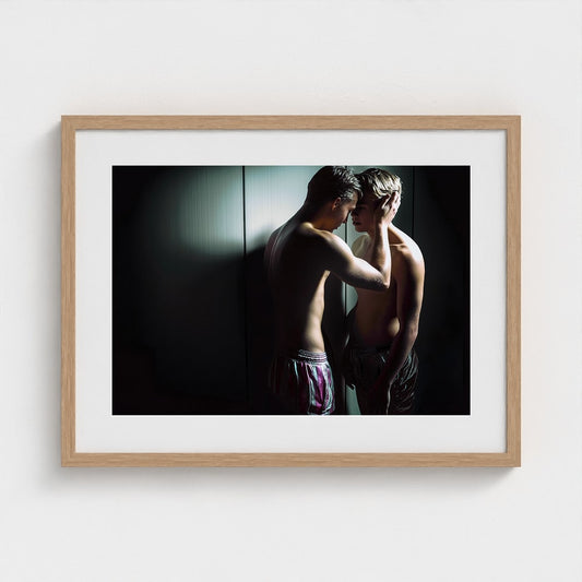 Intimate Masculine Portrait in Shadowed Grey Light