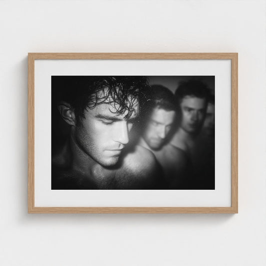 Contemplative Male Portrait in Soft Monochrome Light