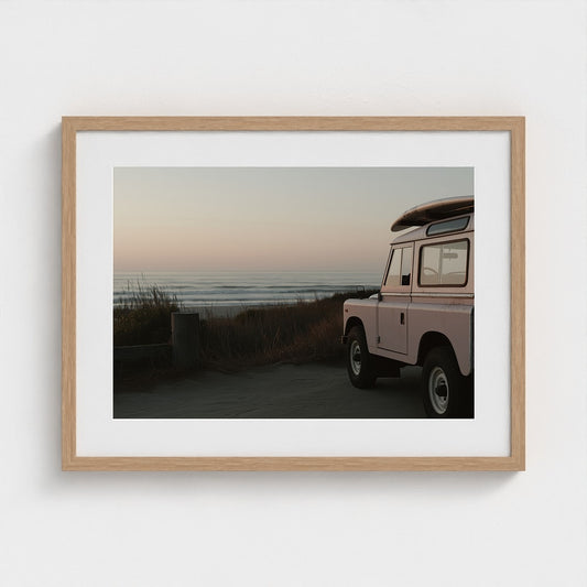 Pink Vintage Beach Vehicle at Serene Coastal Sunrise