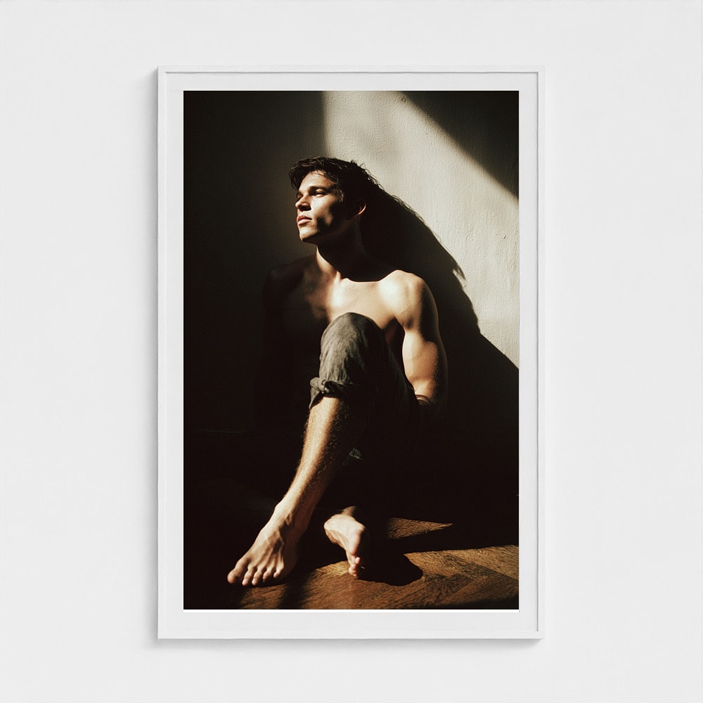 Contemplative Male Portrait in Sunlit Denim Study