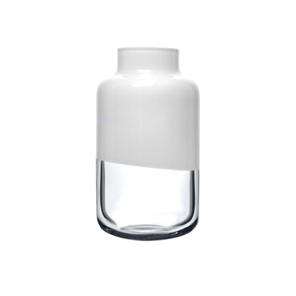 The NUDE Glass Magnolia Vase in medium, featuring a classic opal white finish and clean curved lines.
