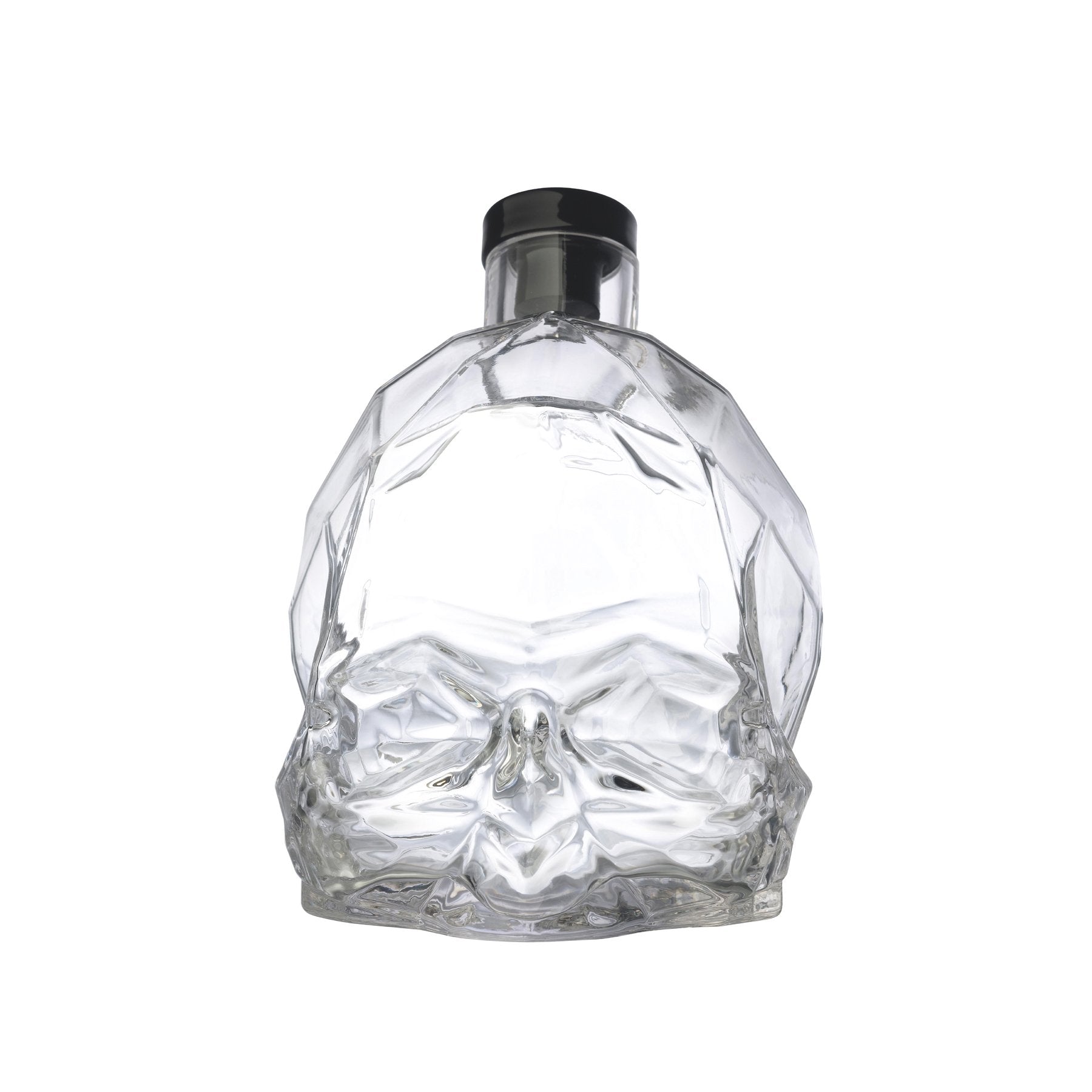 Detail view of the intricate crystal skull stopper on the Memento Mori decanter.