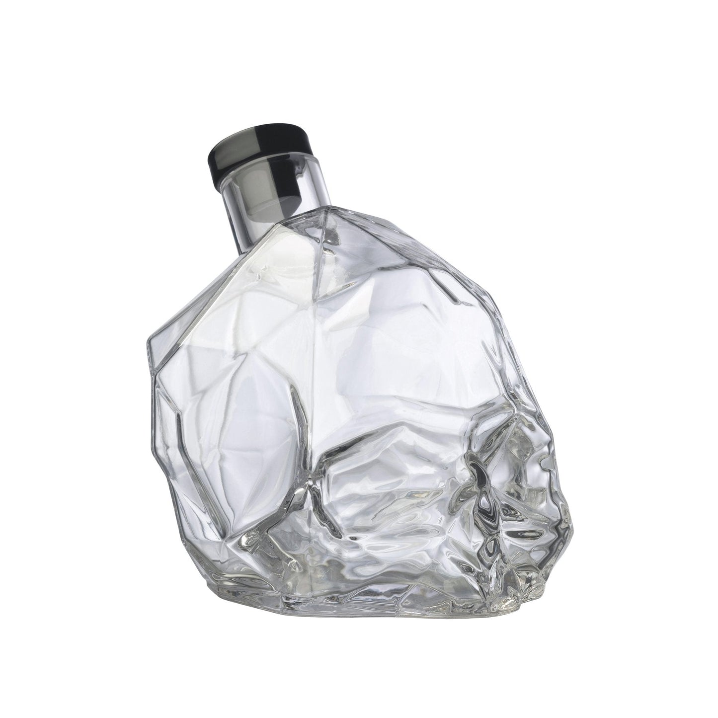 Sleek profile of the modern crystal whiskey bottle showing its clean lines and heavy glass base.