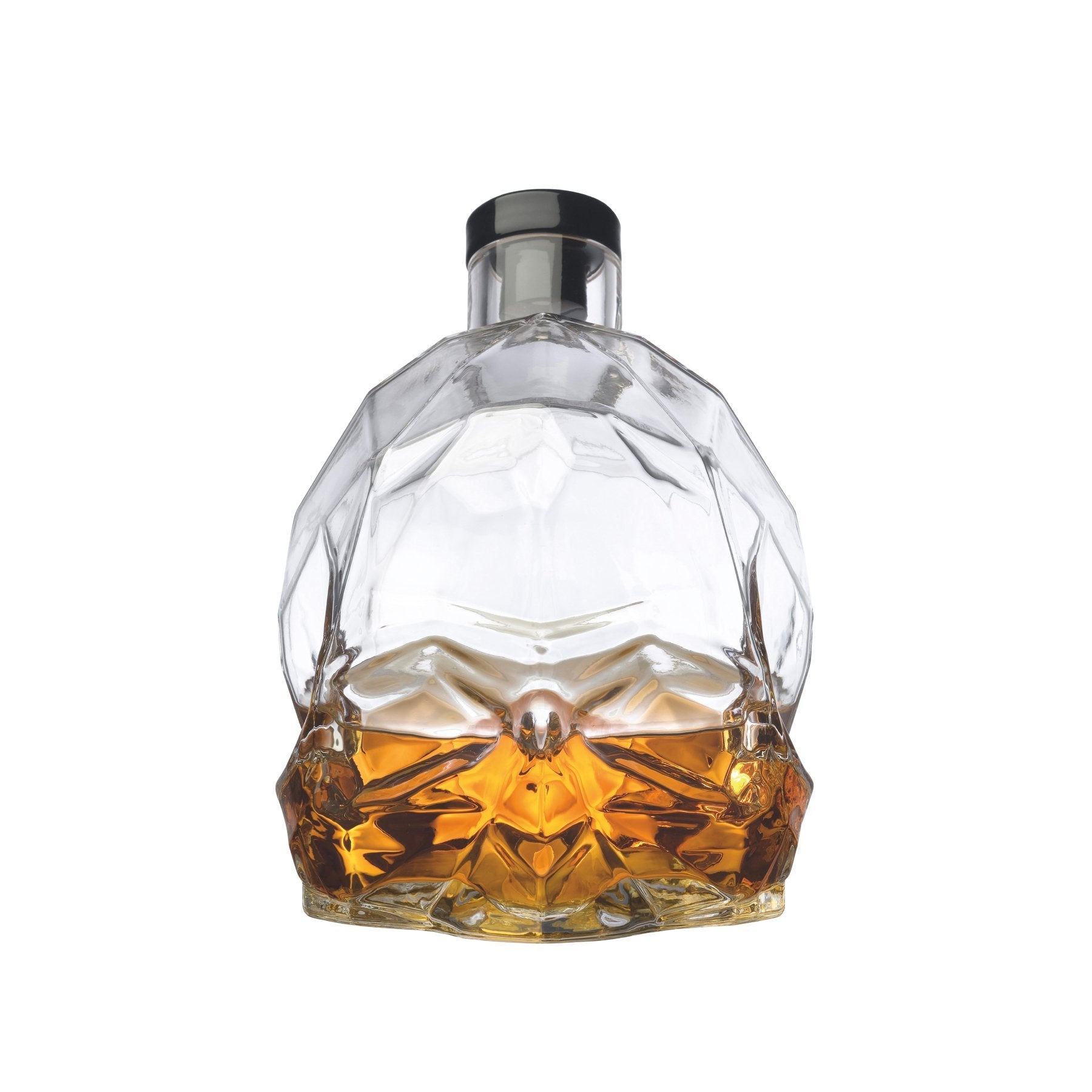 The contemporary NUDE Glass Memento Mori decanter filled with amber whiskey, highlighting its exceptional clarity.