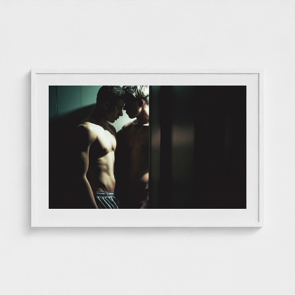 Intimate Portrait of Two Men in Shadowed Light