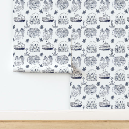 Swatch sample of coastal toile wallpaper featuring maritime scenes and boardwalk paths.