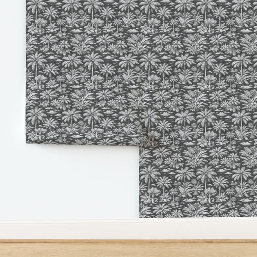 Roll of Palmy Weather wallpaper in refined Charcoal colorway.