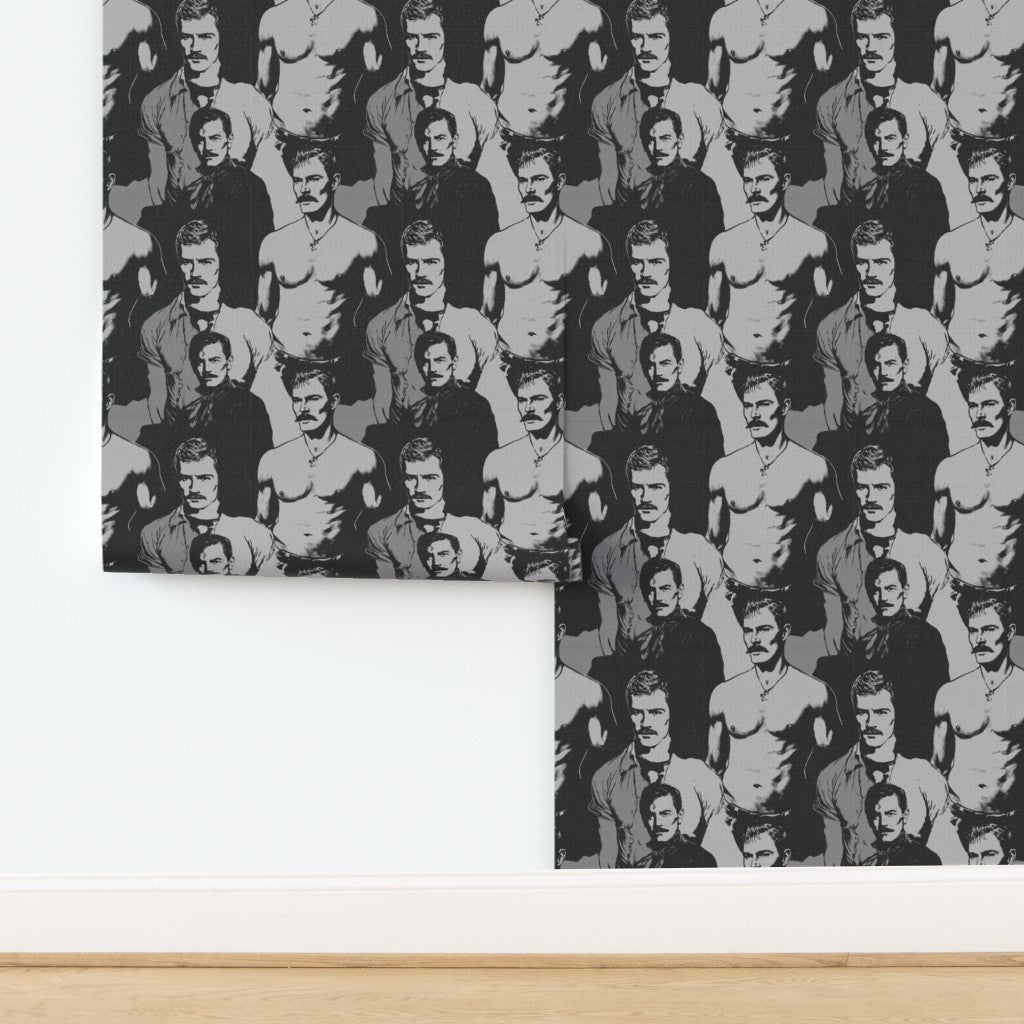 Two rolls of graphic gentleman design wallpaper arranged side by side
