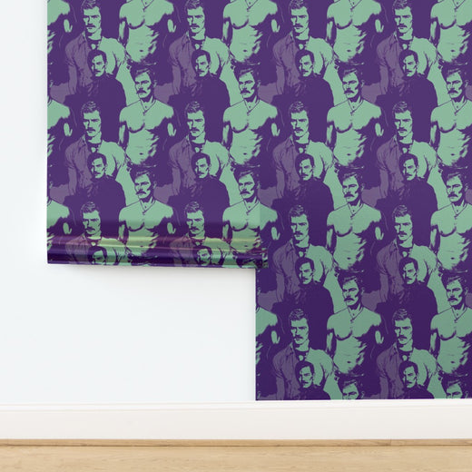 Top-down view of rolled Purple and Mint retro design wallpaper